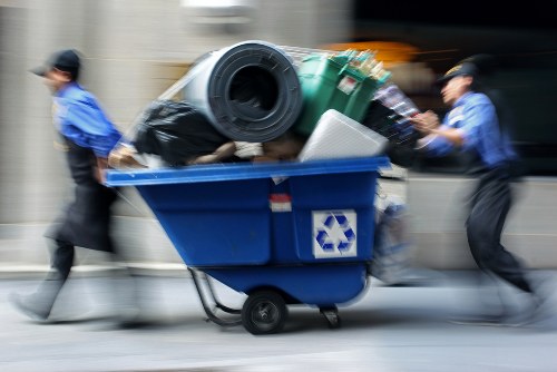 Operatives conducting safe rubbish removal in a residential flat